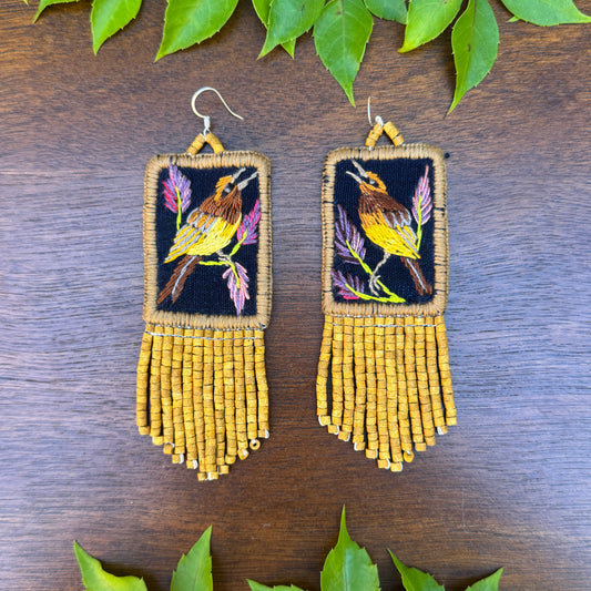 Handmade Guatemalan Embroidered Wren Inspired Bird Earrings with Clay Bead Fringes and Silver Hooks, light mustard
