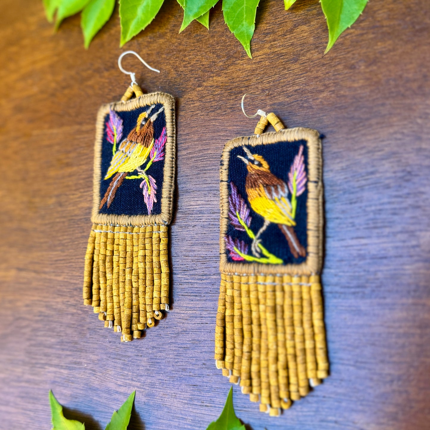 Handmade Guatemalan Embroidered Wren Inspired Bird Earrings with Clay Bead Fringes and Silver Hooks, light mustard