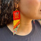 Handmade Statement Earrings with Aguacatán Textile & Graduated Clay Bead Fringe, burnt orange square