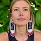 Handmade Guatemalan Embroidered Tropical Bird Earrings with Clay Bead Fringes and Silver Hooks, white pink