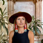 Handmade Beaded Earrings with Vintage Textile from Chichi and Clay Bead Drops, burnt orange rectangle