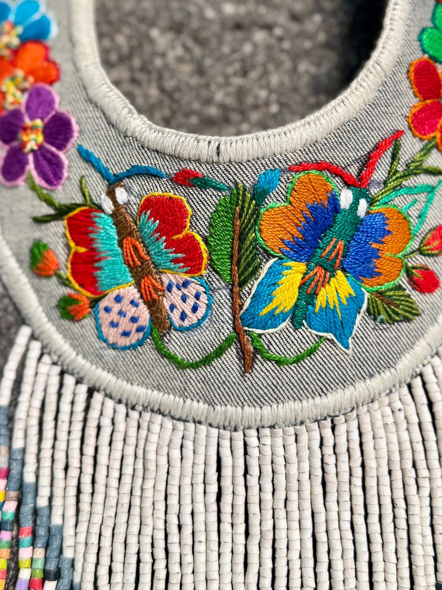Bib Necklace with Guatemalan Butterfly Embroidery from Santiago with Ceramic Bead Fringes, white/denim